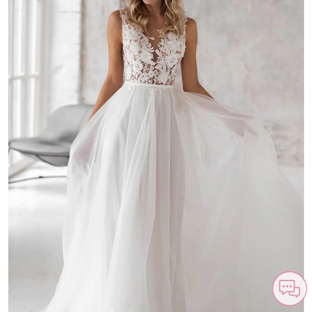 New size 8 wedding dress from June Bridals.